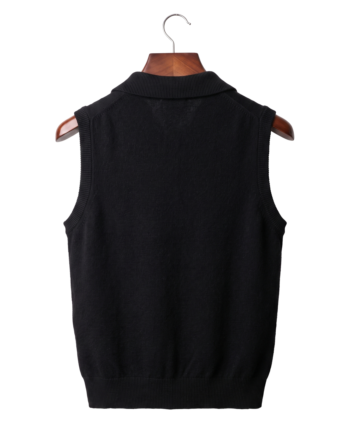 The Windsor cashmere gilet, back view on a mahogany hanger