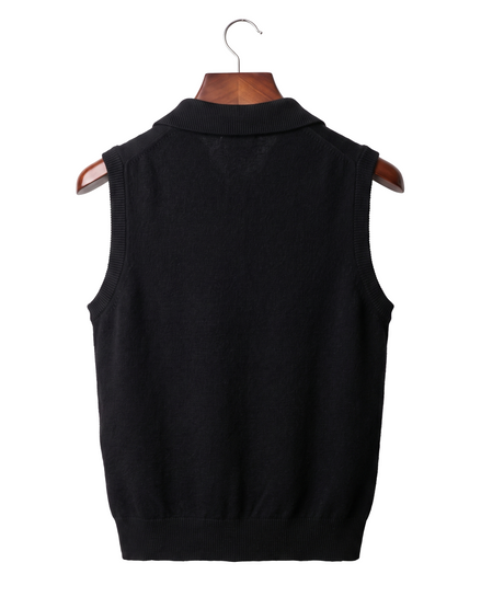 The Windsor cashmere gilet, back view on a mahogany hanger