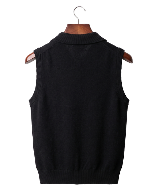 The Windsor cashmere gilet, back view on a mahogany hanger