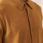Close-up of the knitted body against the shirt collar on The Fairhaven