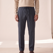 Model wearing The Cranleigh drawstring trousers, front view
