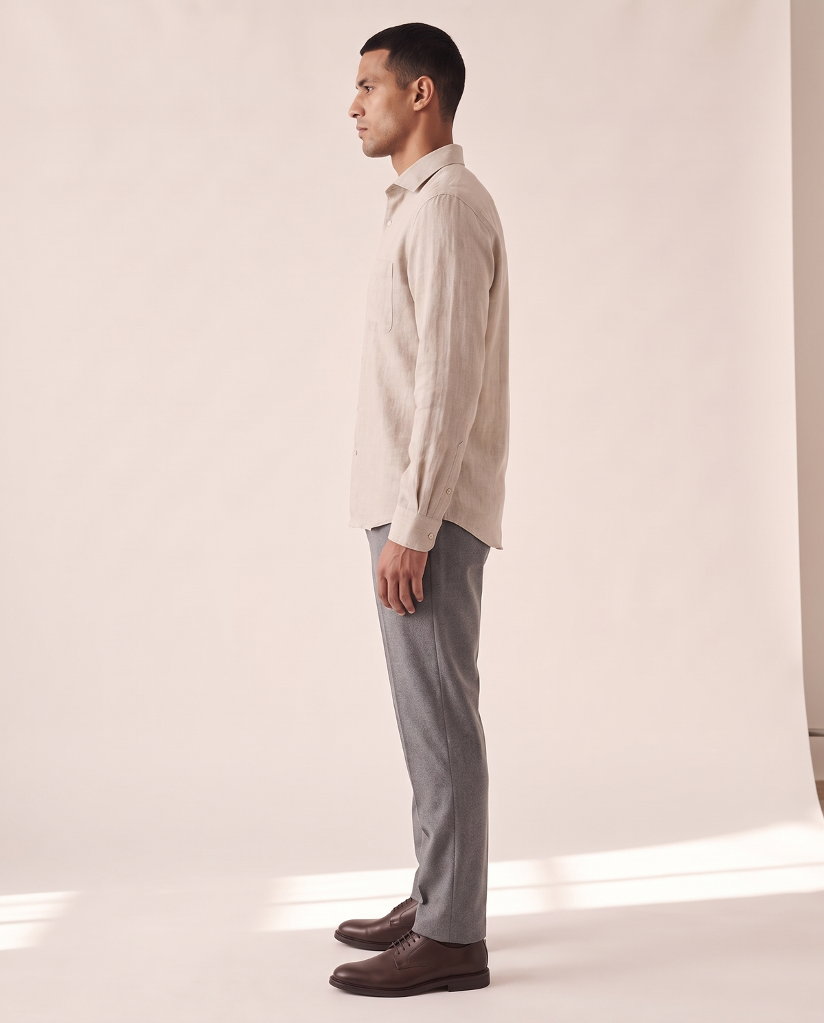 The Salcombe linen shirt shown in side profile