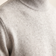 Close-up of the ribbed mock neck on The Denby