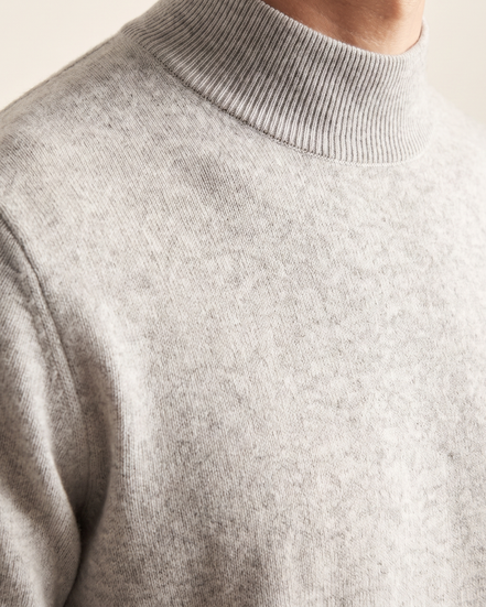 Close-up of the ribbed mock neck on The Denby