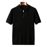 The Osborne ribbed zip polo in black, folded collar, front on hanger