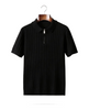 The Osborne ribbed zip polo in black, folded collar, front on hanger