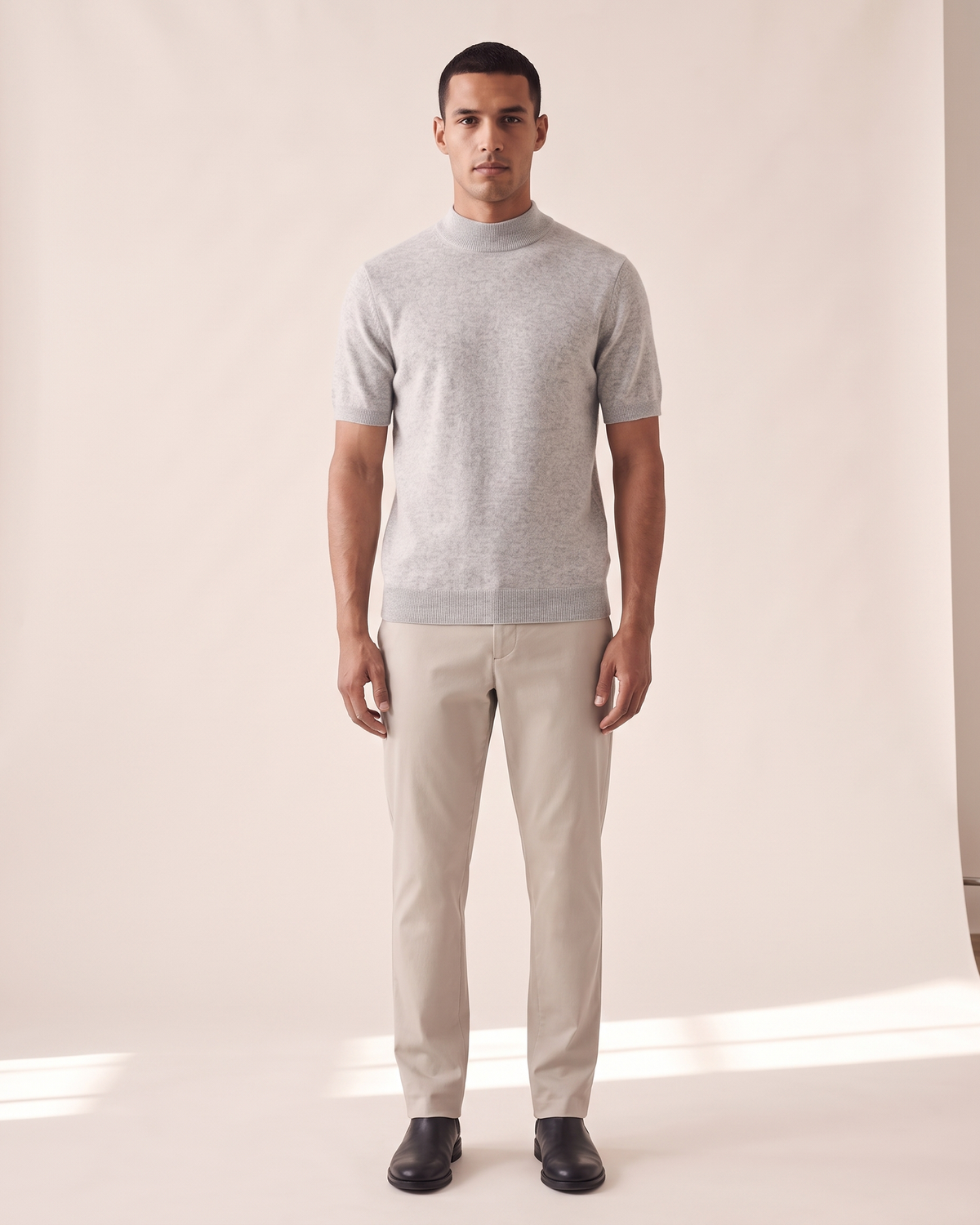 Model wearing The Denby cashmere mock neck tee, front view