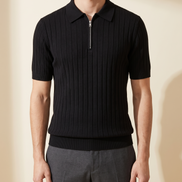 The Osborne ribbed zip polo in black, front view on model