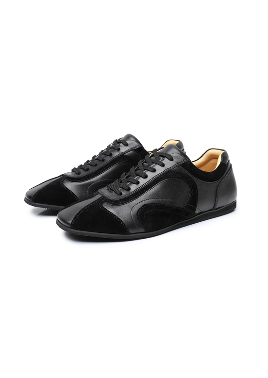 The Cadogan retro leather trainer in black, three-quarter front view of the pair
