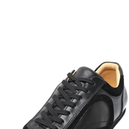 The Cadogan trainer in black, close three-quarter view of the pair