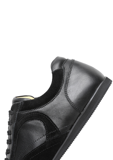 The Cadogan trainer in black, side profile