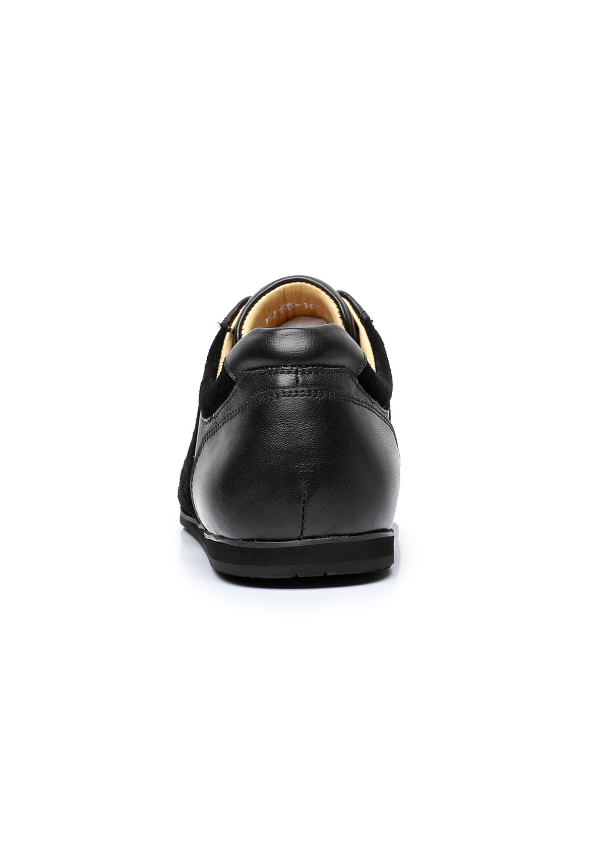 The Cadogan trainer in black, seen from behind