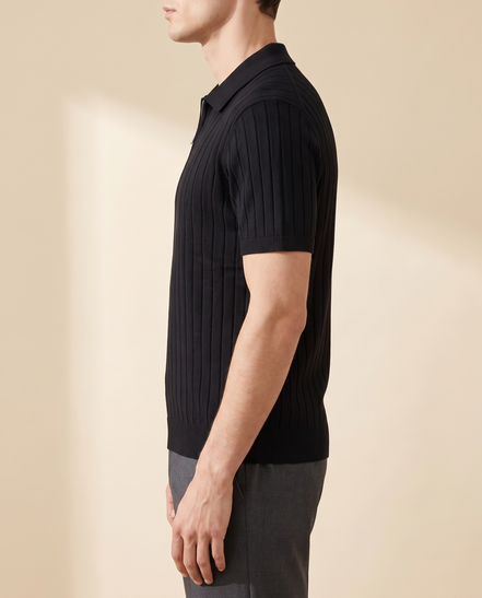 The Osborne ribbed zip polo in black, side profile on model