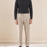 Model wearing The Somerset pleated linen trousers, front view