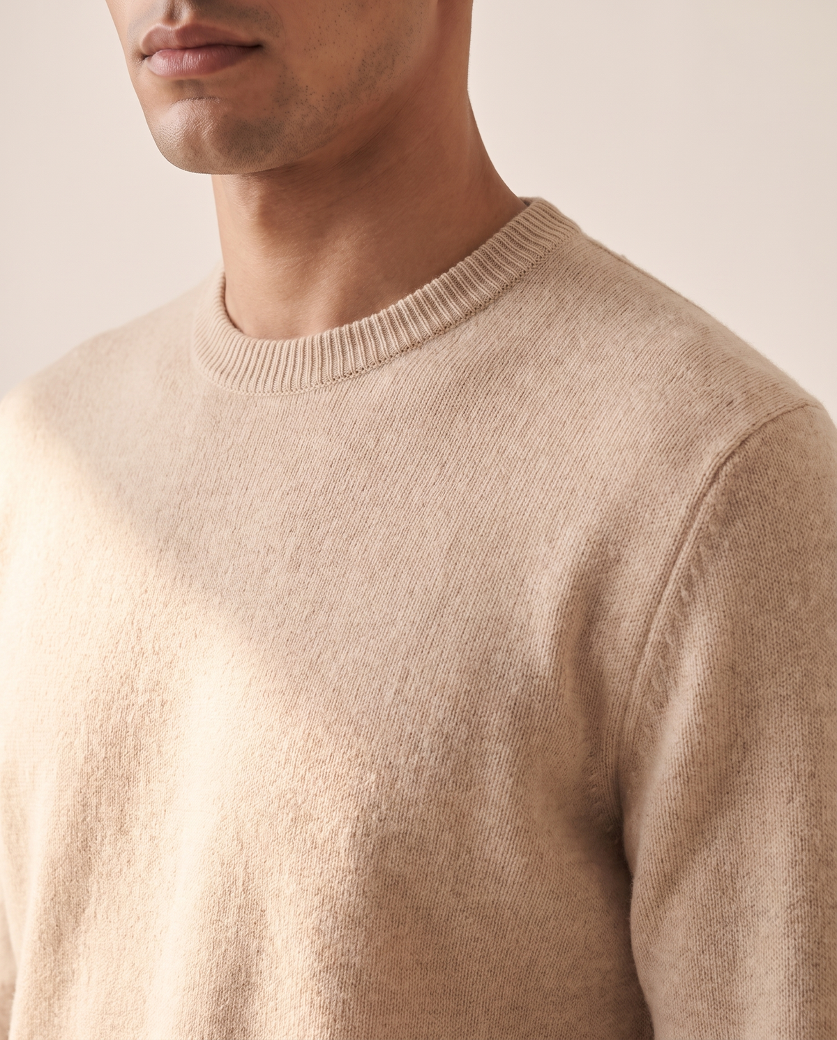 Close-up of the ribbed crew neckline and merino knit of The Berkeley