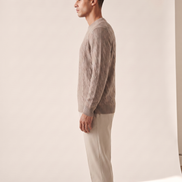 The Malvern cable crewneck shown in side profile