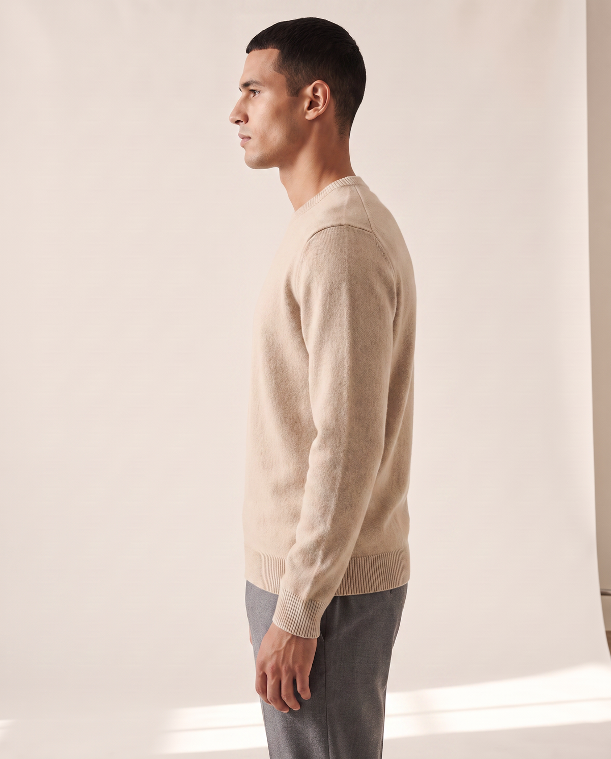 The Berkeley merino crewneck jumper shown in side profile