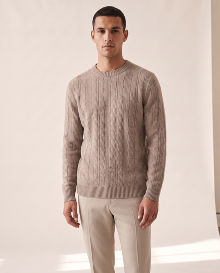 Model wearing The Malvern merino cable crewneck, front view