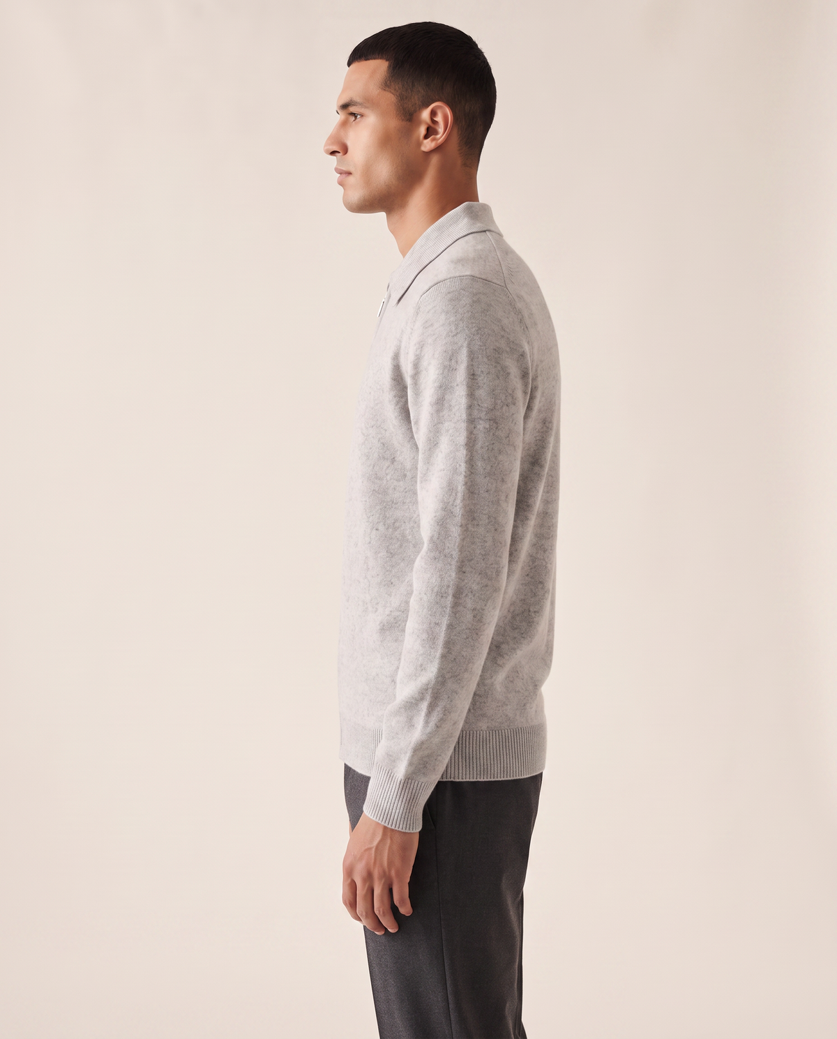 The Selby merino half-zip polo shown in side profile