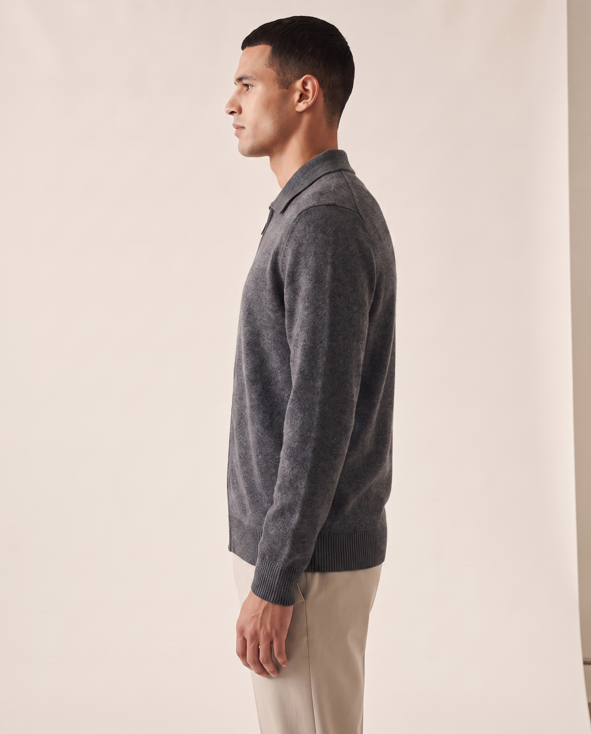 The Harrogate cashmere full-zip cardigan shown in side profile