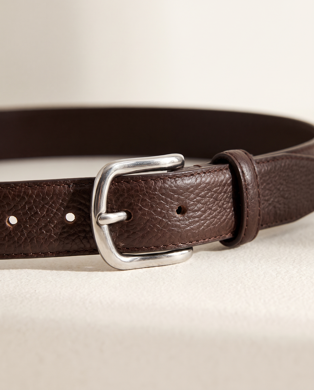 Close-up of the buckle and edge stitching on The Chester belt