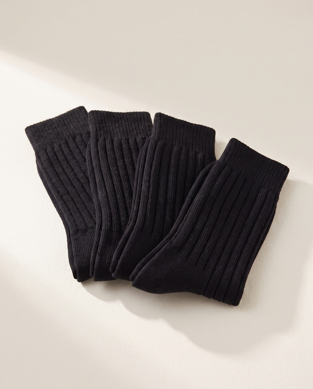 The four-pair pack of ribbed crew socks, folded