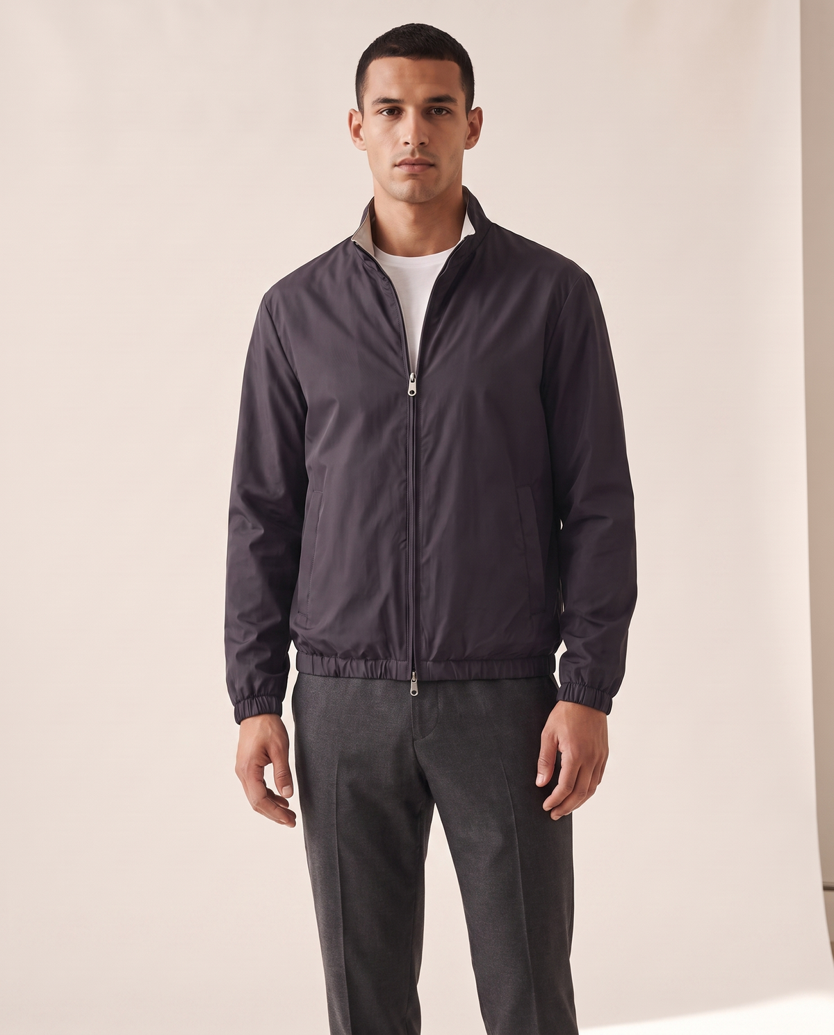 Model wearing The Sterling technical windbreaker, front view