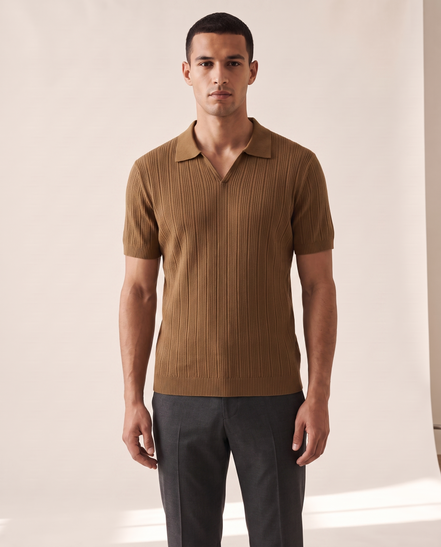 Model wearing The Henley open-collar knit polo, front view