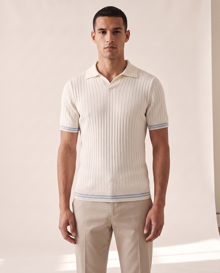 Model wearing The Radley ribbed knit polo in ivory, front view