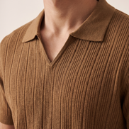 Close-up of the open buttonless collar on The Henley