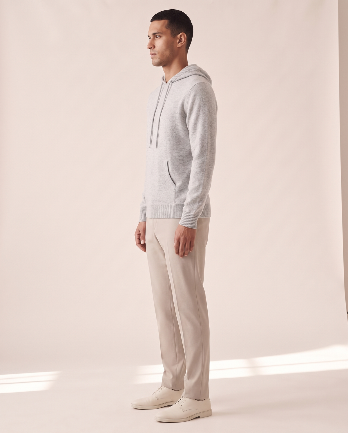 The Ashdown merino hooded jumper shown in side profile