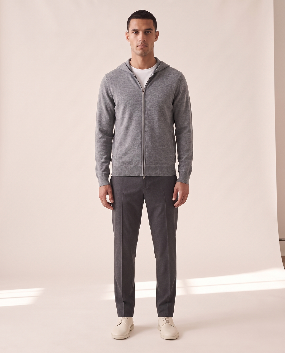 Model wearing The Brackley merino zip-through hoodie, front view