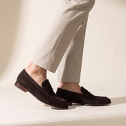 Close-up of The Hampton worn, side profile of the loafer showing the leather sole edge and stacked heel