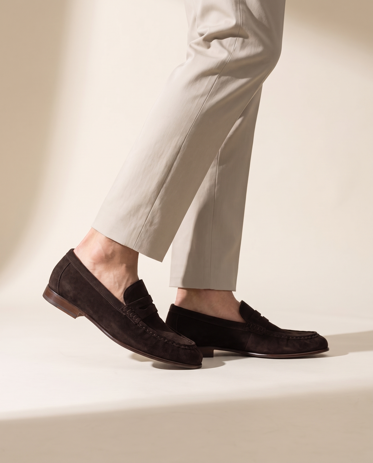 Close-up of The Hampton worn, side profile of the loafer showing the leather sole edge and stacked heel