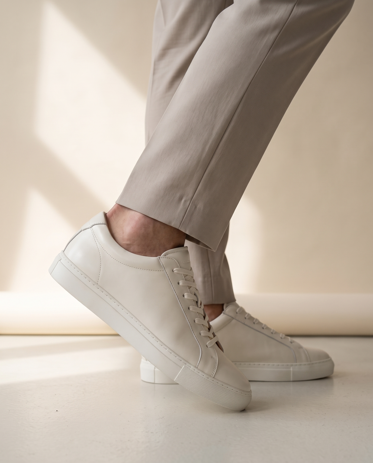 Close-up of The Stanmore worn, side profile showing the white cupsole edge and heel