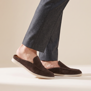 Close-up of The Sloane worn, side profile showing the open back of the mule and the cream sole edge