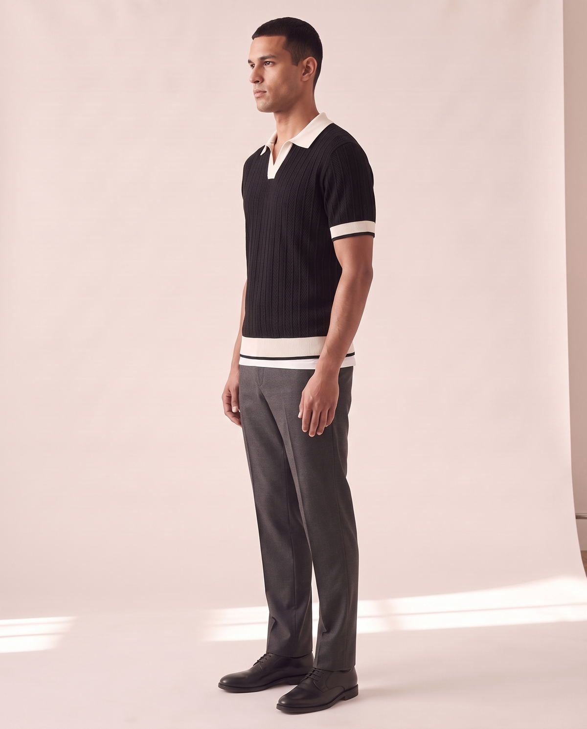 Model wearing The Marlow Textured Knit Polo, side profile