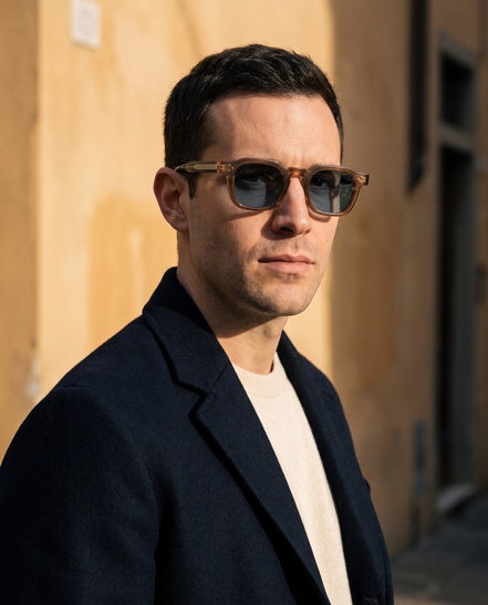 The Kingsley Round Sunglasses worn on a sunlit street
