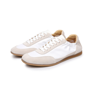 The Petersham suede panel trainer in ivory, three-quarter front view of the pair