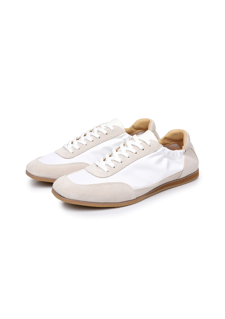 The Petersham suede panel trainer in ivory, three-quarter front view of the pair