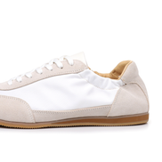 The Petersham trainer in ivory, close side view