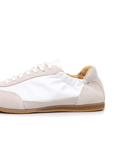 The Petersham trainer in ivory, close side view
