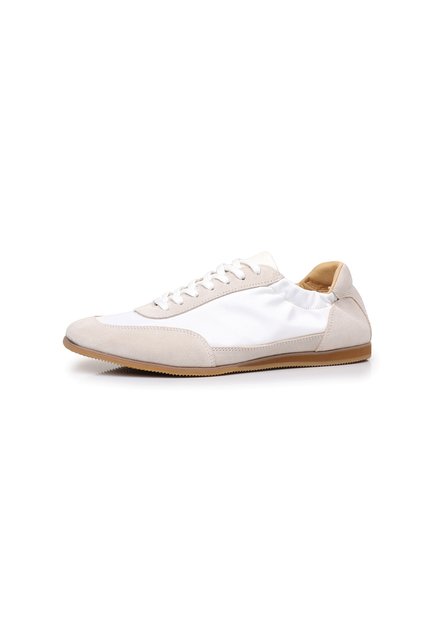The Petersham trainer in ivory, side profile